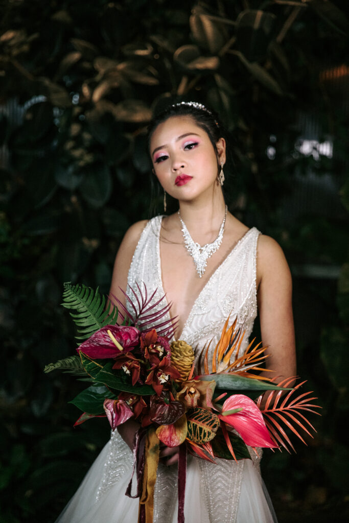 An asian bride with bridal glamour makeup and custom lip color